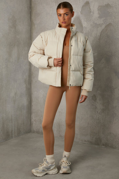 Cropped Puffer Jacket with Detachable Sleeves in Sand